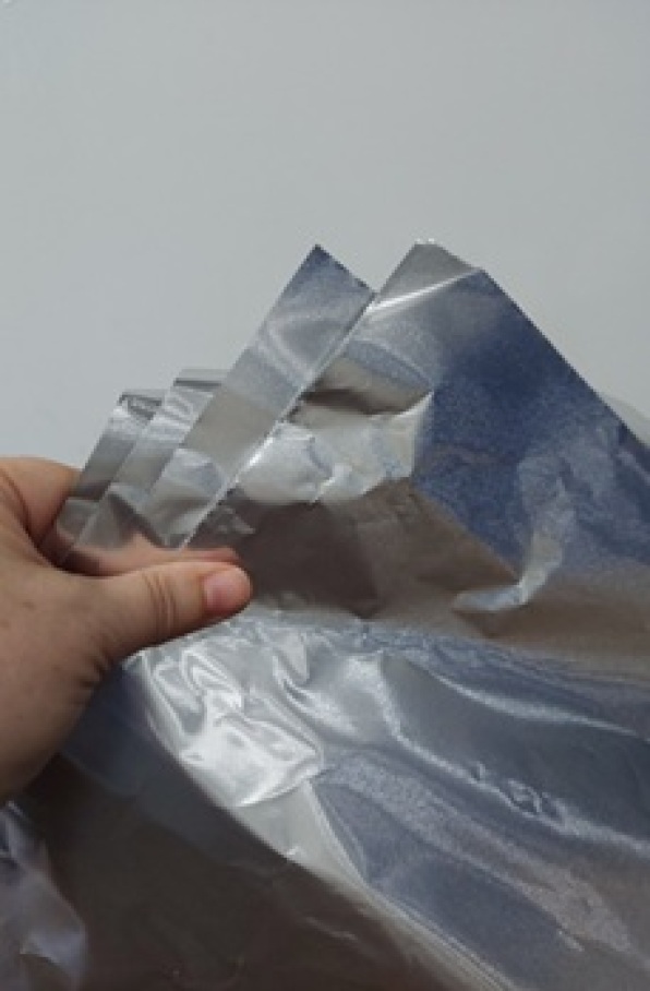 RETALLS DE MATERIAL COMPLEX (PAPER + ALUMINI + PLÀSTIC)